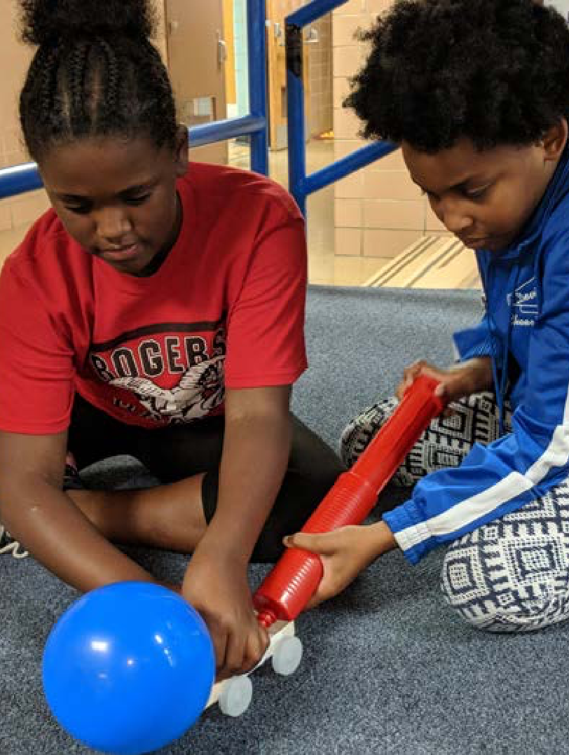 Students at Springfield Elementary School (Ohio) prepare to launch their balloon-powered JetToy car during the A World In Motion program.